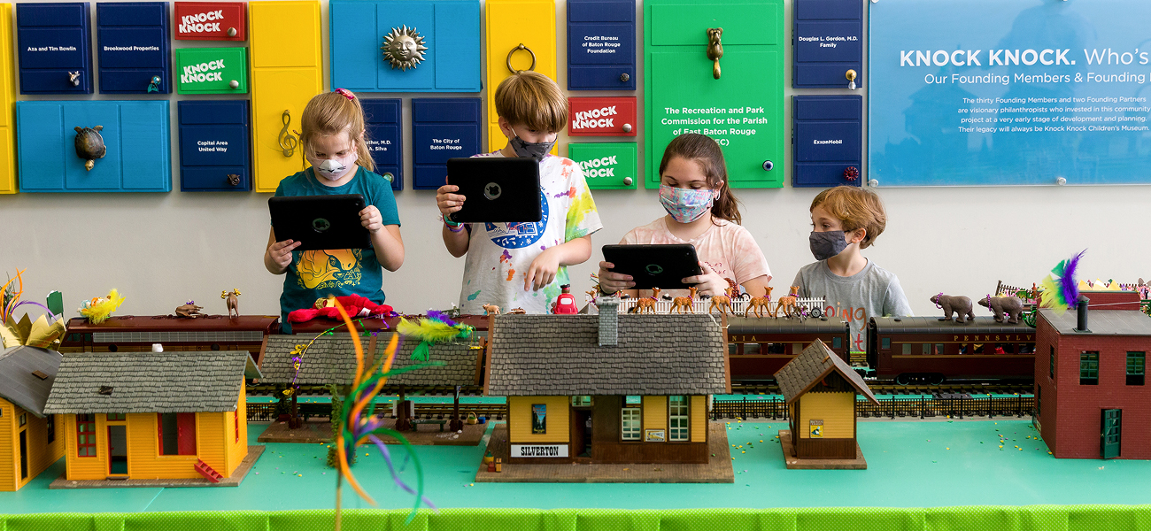 Kids playing on toy table at The Knock Knock Children's Museum
