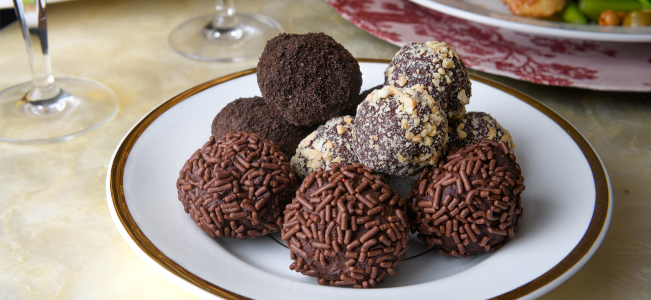 plate of different chocolate truffles